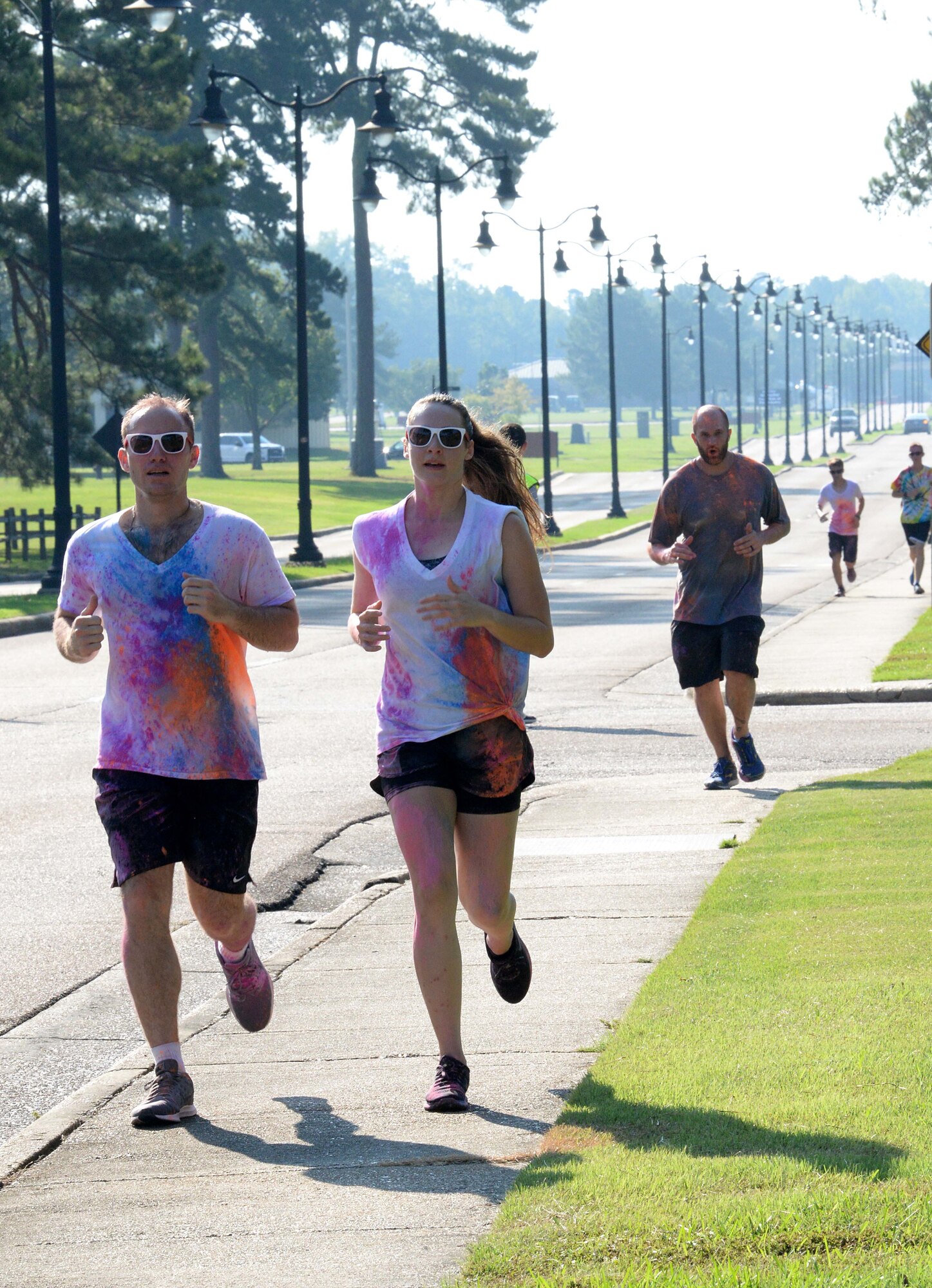 Participants run during the sixth annual color run Sept. 22, 2018, at Columbus Air Force Base, Mississippi. The event included a 5K run or a 2-mile run that participants could choose between.  (U.S. Air Force photo by Airman Hannah Bean)