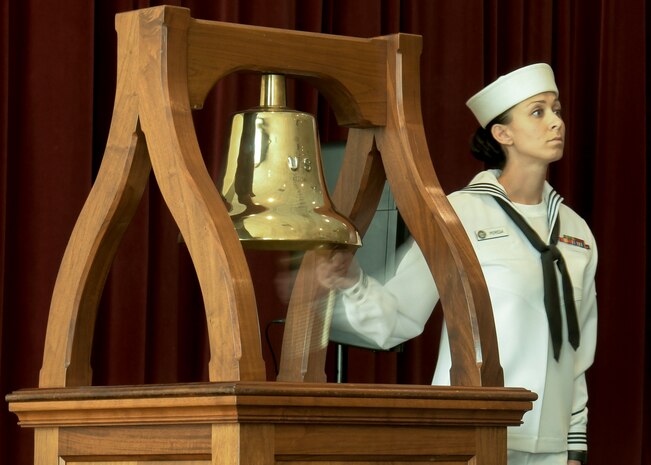 Petty Officer 2nd Class Lauren Pereda, Naval Health Clinic Charleston hospital corpsman, rings a ceremonial bell during the Bells Across America memorial ceremony Sept. 27, 2018, at Joint Base Charleston, S.C. The ceremony is an annual U.S. military tradition held across the country to honor and commemorate fallen service members. During the ceremony, a bell is rung after each service member’s name is read.