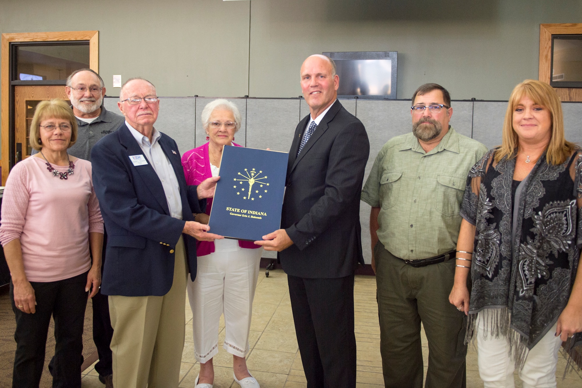 Jay Kendall, Miami County Veteran’s Services service officer, presented the Sagamore of the Wabash award to U.S. Army Ret. Chief Warrant Officer Dave Shrearer on behalf of Indiana Gov. Eric Holcomb during a dinner at Grissom, Aug. 23, 2018. The state of Indiana describes the award as a personal tribute given to those who have rendered a distinguished service to Indiana or the governor. (U.S. Air Force photo by Tech. Sgt. Ben Mota)