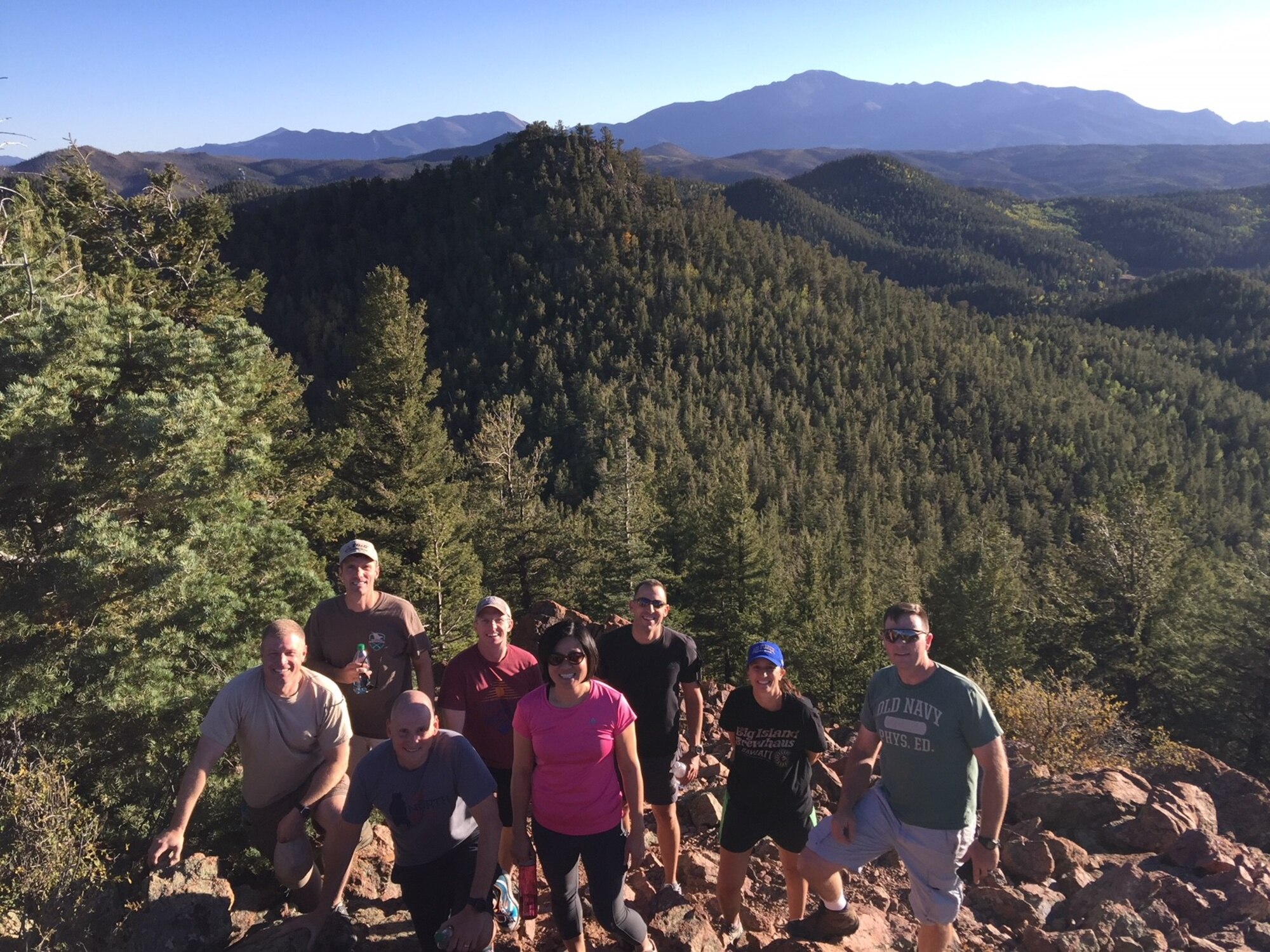 A small group of 340th Flying Training Group Commanders Summit attendees pause for a photo opportunity during a hike to Eagles Peak outside of Colorado Springs, Colorado. Incorporating such teambuilding activities in leadership summits helps strengthen team relationships. Front row, left to right, are 340th FTG Commander Col. Allen Duckworth, 5th Flying Training Squadron Commander Lt. Col. Matthew Johnson, and 340th FTG Deputy Commander Col. Janette Thode. Back row, left to right, are Lt. Col. Daniel Scheuermann, 97th FTS; Lt. Col. James Halstead, 340th FTG; Lt. Col. William Pope, 96th FTS; Lt. Col. Kristen Kent, 39th FTS; and Lt. Col. Travis Higbee, 5th FTS. (U.S. Air Force photo by Lt. Col. Brian Frisbey)