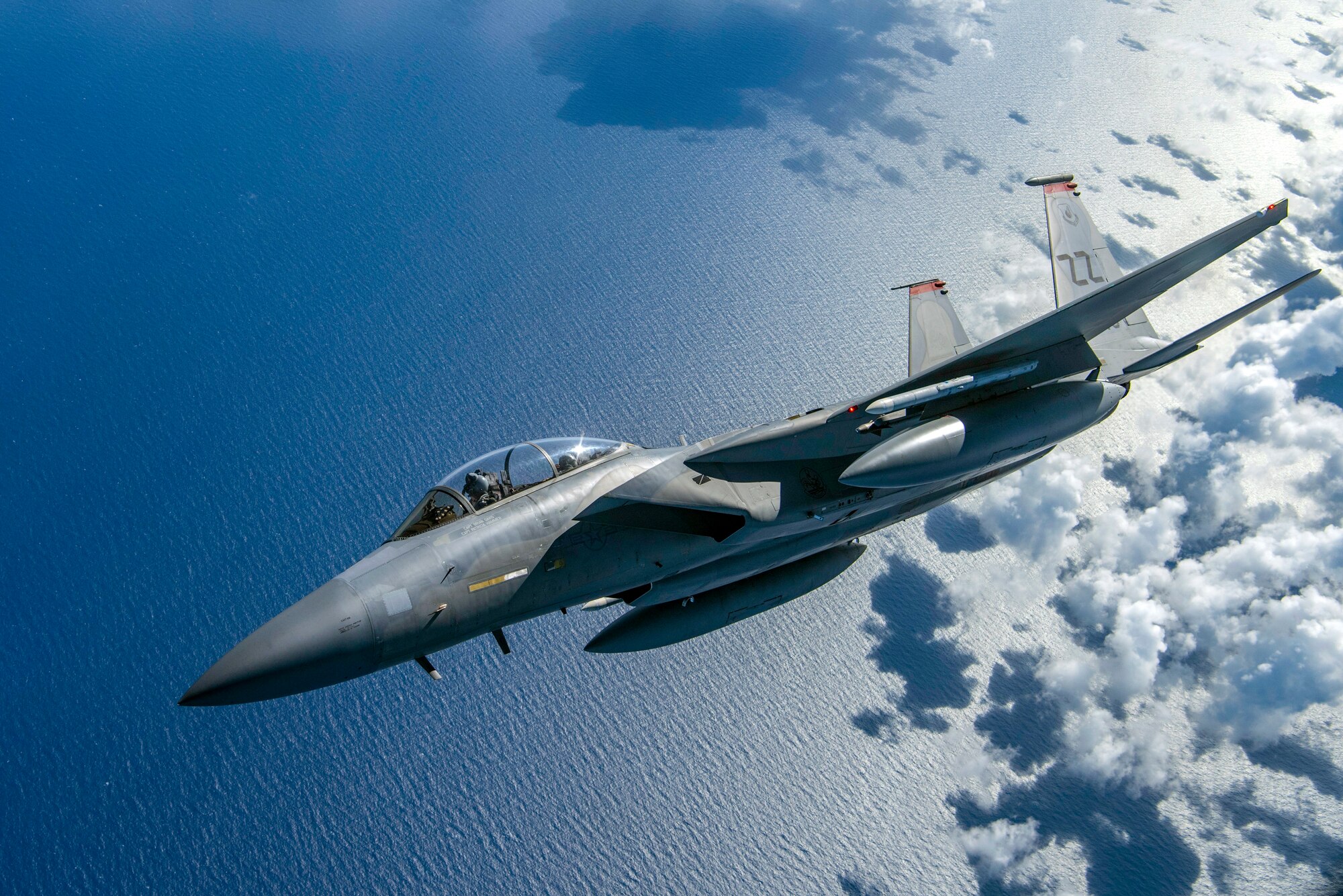 A U.S. Air Force F-15D Eagle flies above the Mariana Islands in support of exercise Valiant Shield, Sept. 18, 2018. The exercise helps enable real-world proficiency in sustaining joint forces through detecting, locating, tracking and engaging units at sea, in the air, on land, and in cyberspace in response to a range of mission areas. (U.S. Air Force photo by Senior Airman Zachary Bumpus)