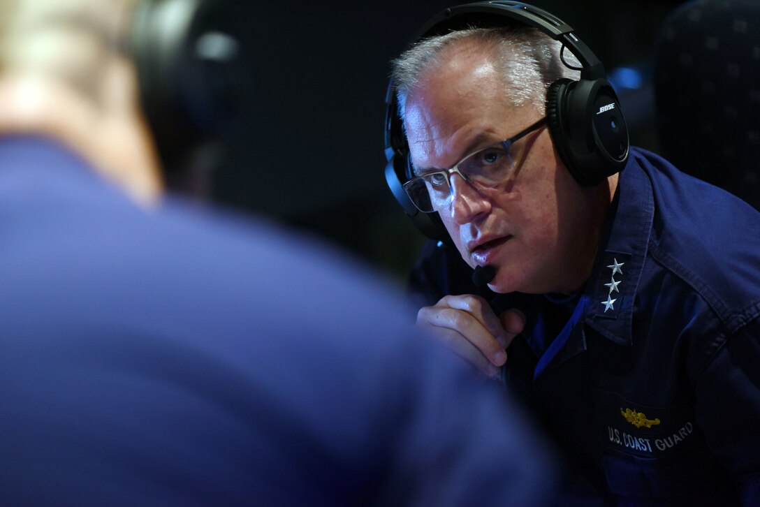 Vice Adm. Scott Buschman, Coast Guard Atlantic Area Commander, views a flight-map before traveling to North Carolina to assess damages caused by Hurricane Florence from a Coast Guard C-130 airplane in Norfolk, Virginia, Sept. 16, 2018. The Coast Guard continues rescue operations throughout the region and has saved 64 lives since Florence made landfall, this overflight on a Coast Guard Elizabeth City C-130 allowed passengers to get a over-all aerial view of the region's status.