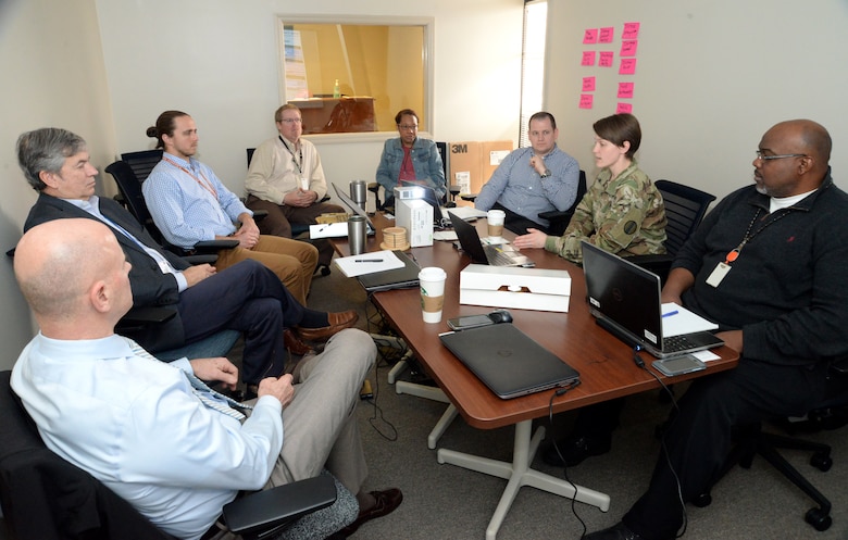 Maj. Kayla Ramotar, second from right, Holistic Health and Fitness action officer and command dietitian from the Army Center for Initial Military Training, leads a group discussion during a Value Engineering workshop at Huntsville Center in March to examine the Army’s proposed Soldier Physical Readiness Centers.