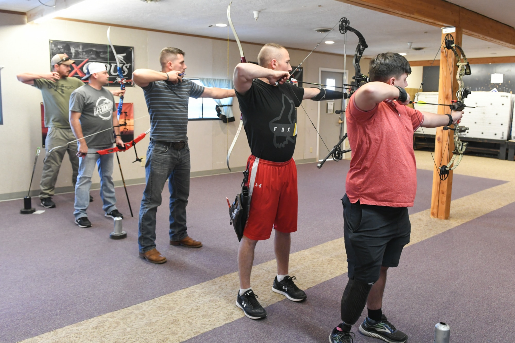Active duty Marines from the Wounded Warrior Battalion train with both compound and recurve bows during a Paralympic Archery Training Camp Sept. 25, 2018, at Hill Air Force Base, Utah. Hill hosted the camp Sept. 24-28 through the Paralympic Military Program, which is run by the United States Olympic Committee in partnership with the U.S. Department of Defense and U.S. Department of Veterans Affairs. (U.S. Air Force photo by Cynthia Griggs)