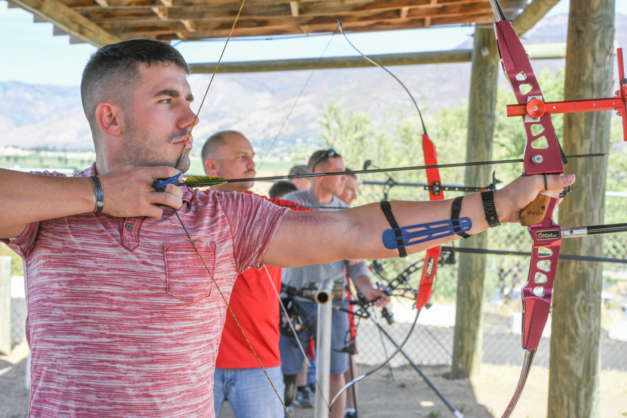 Marine Cpl. Troy Frodl from Wounded Warrior Battalion East at Fort Sam Houston, Texas, aims his recurve bow during a Paralympic Archery Training Camp Sept. 25, 2018, at Hill Air Force Base, Utah. Hill hosted the camp Sept. 24-28 through the Paralympic Military Program, which is run by the United States Olympic Committee in partnership with the U.S. Department of Defense and U.S. Department of Veterans Affairs. (U.S. Air Force photo by Cynthia Griggs)