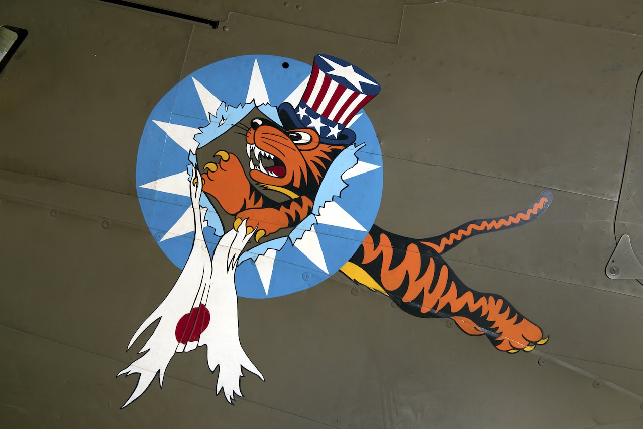 An illustration of a tiger on the side of a plane.