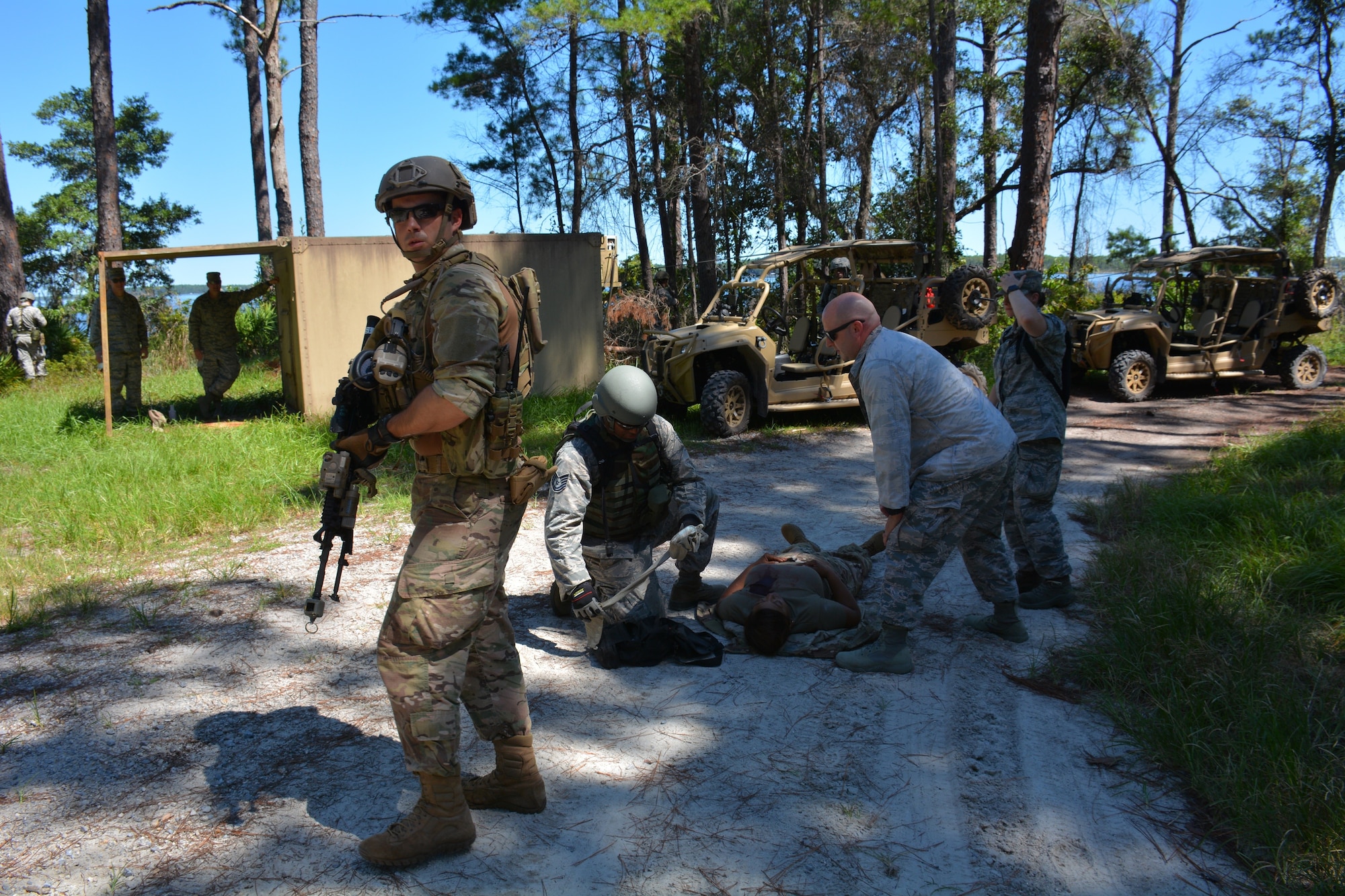 An Airman stands guard during a Combat Support Wing exercise scenario that trained and tested participants’ ability to provide combat first aid 16 September at Tyndall Air Force Base, Florida.