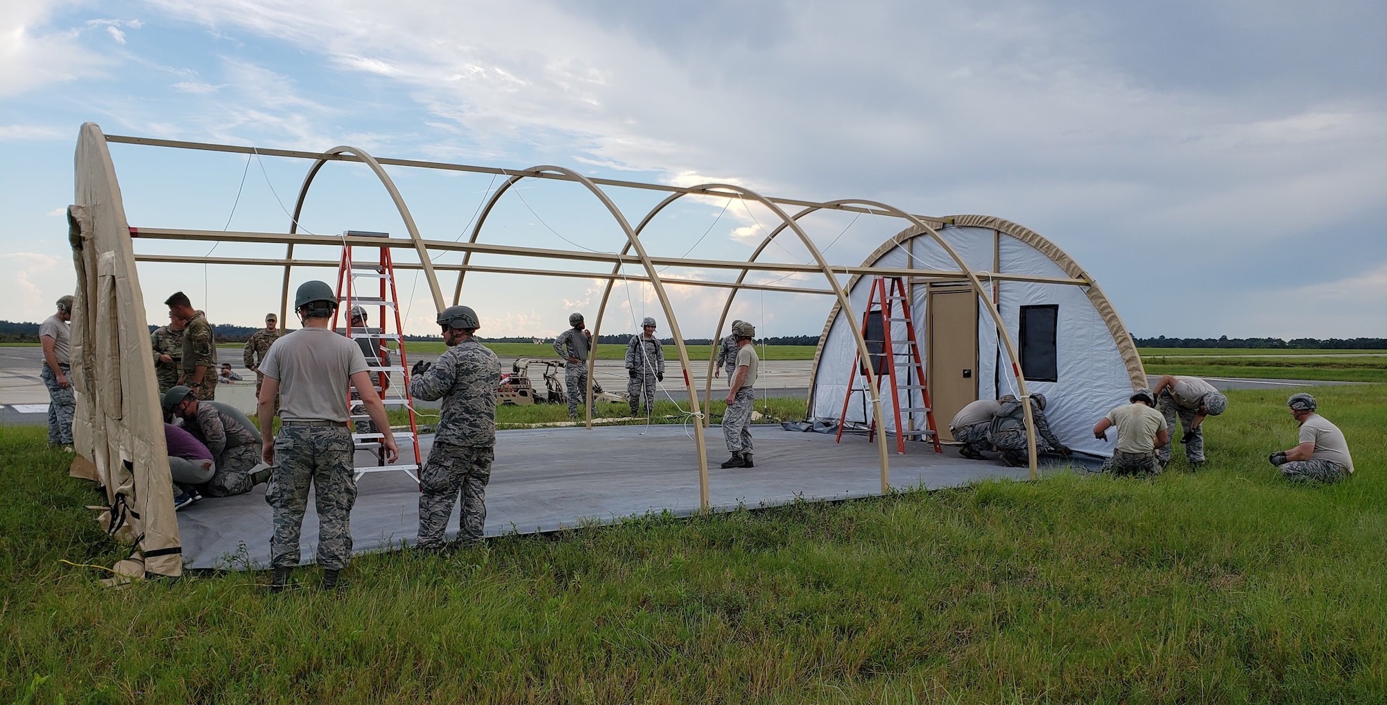 Airmen build a shelter for communications and operations activities 17 September during the Combat Support Wing exercise at Moody AFB, Georgia.