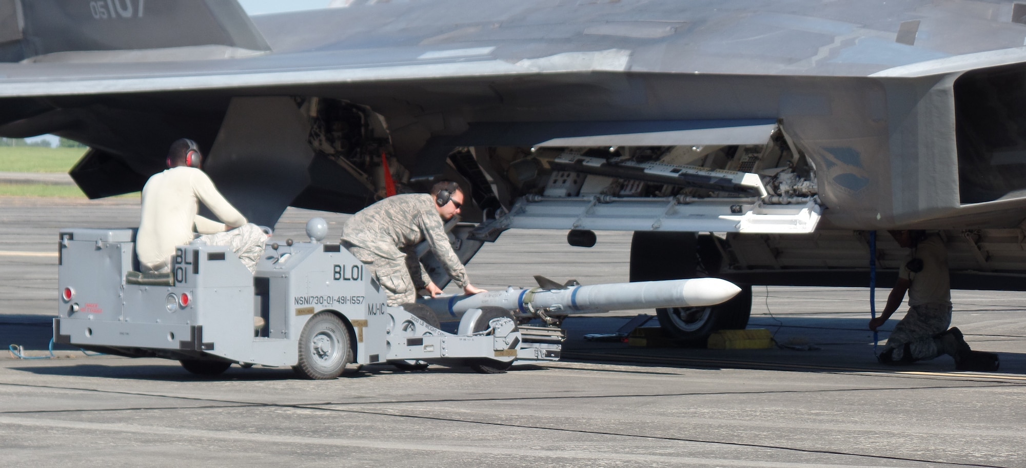Airmen simulate arming an F-22 Raptor during the Combat Support Wing exercise at Moody AFB, Georgia on 18 September.