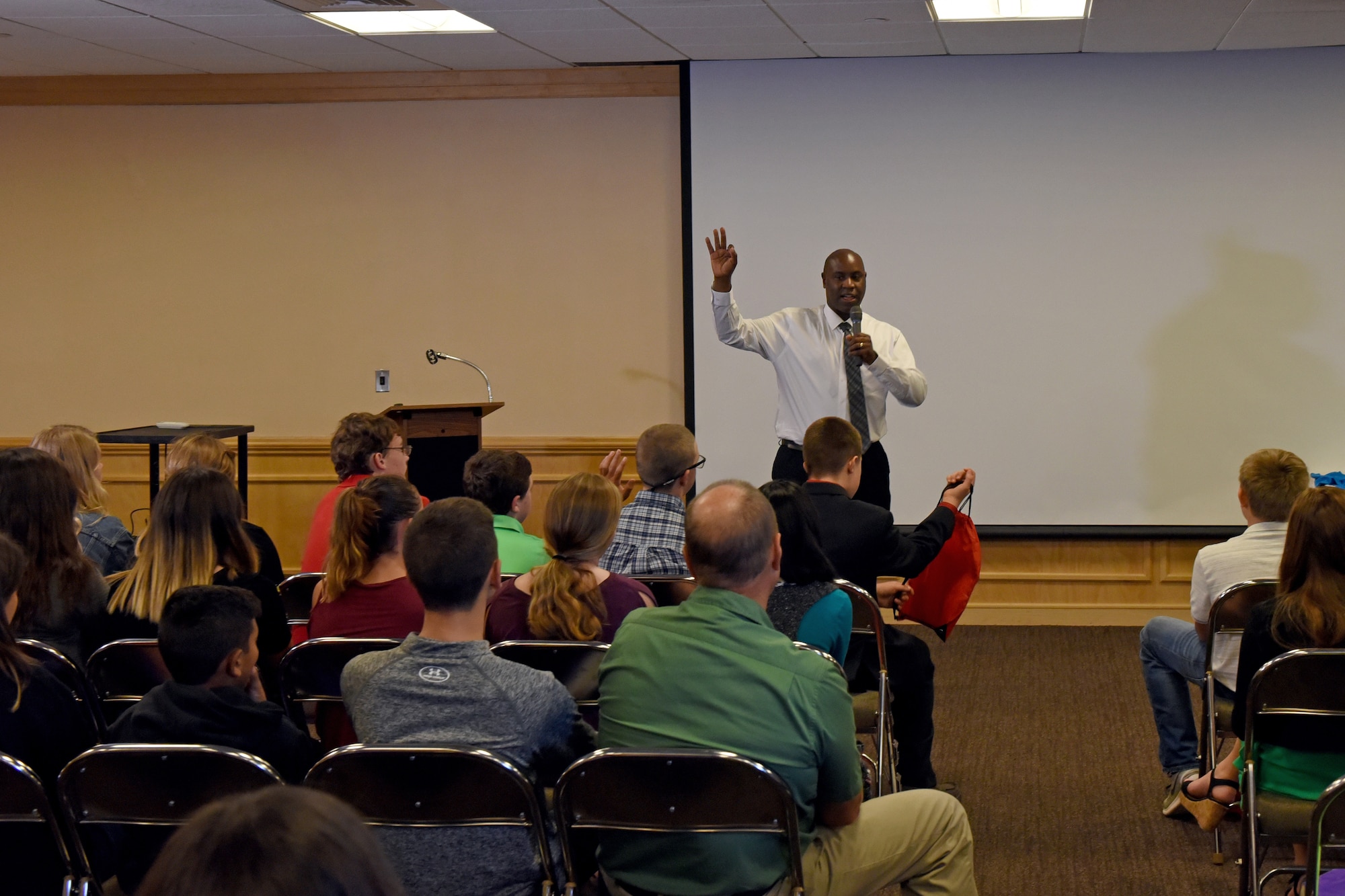 Angelo State University Professor, Herman Howard, speaks to a group of eighth graders during the Chamber of Commerce Business Expo at the McNease Convention Center, in San Angelo, Texas, Sept. 27, 2018. Howard shared with the students that if you want to be extraordinary, you must be willing to do extra, this applies to school, sports and plans for the future. (U.S. Air Force photo by Airman 1st Class Zachary Chapman/Released)
