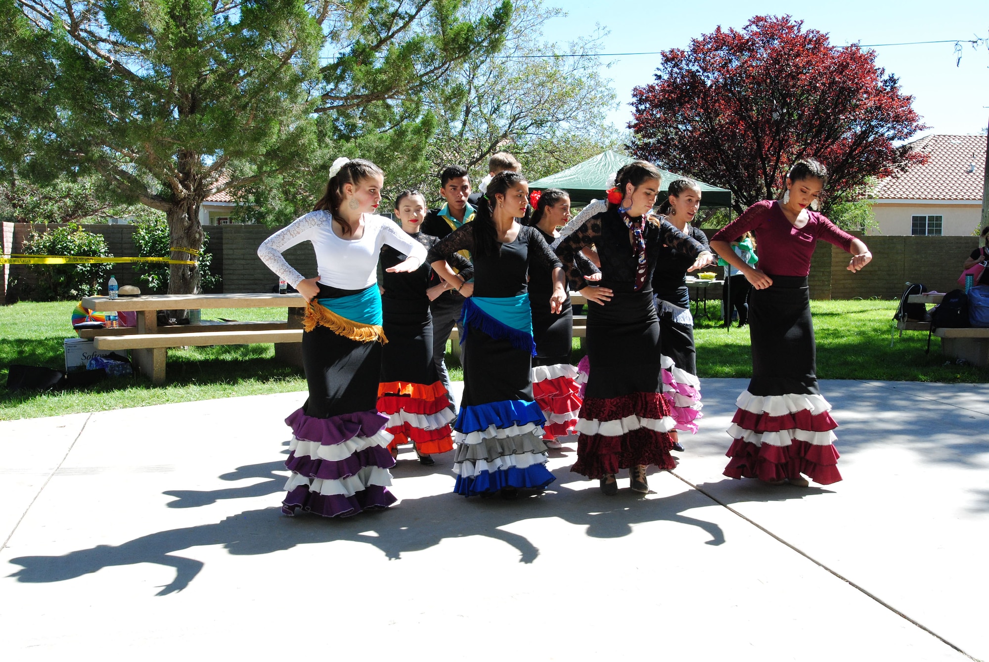 Flamingo dancers perform at the 2018 Hispanic Heritage Diversity Day event at Hardin Field here Sept. 27. This year's event featured the Al Hurricane Jr. Band with keynote speaker Albuquerque District Attorney Raul Torrez. There was also a car show, an art show, food trucks and a samba sizzle Latin dance workout. (U.S. Air Force photo by Jessie Perkins)
