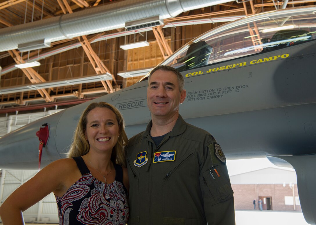 Col. Joseph L. Campo, 49th Wing commander, and his wife Sarah Campo pose in front of the 49th Wing plane. the 49th Wing held a ceremony for its transition to Air Education and Training Command. (U.S. Air Force photo by Airman Autumn Vogt)