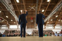 Maj. Gen. Andrew Croft, (left) 12th Air Force commander and Maj. Gen. Patrick Doherty, (right) 19th Air Force commander, sings the Air Force song during the major command reassignment ceremony Sept. 28, on Holloman Air Force Base, N.M. Transitioning to Air Education and Training Command from Air Combat Command will allow the 49th Wing to more effectively execute their mission of training future F-16 Viper and MQ-9 Reaper pilots and sensor operators. (U.S. Air Force photo by Tech. Sgt Amanda N. Junk)