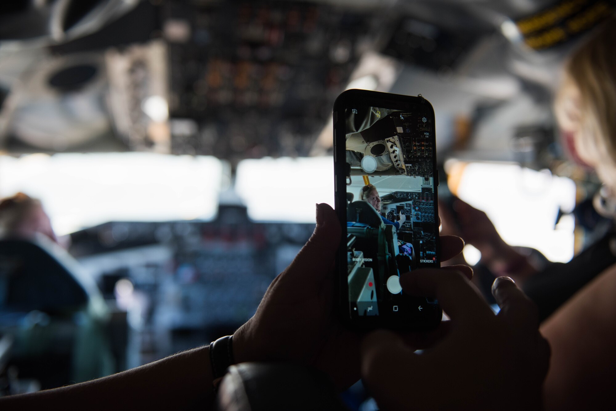 A group from the Commonwealth of the Northern Mariana Islands, the Commonwealth Port Authority, and Department of Defense civilians, contractors and service members take a tour of a KC-135R Stratotanker on Joint Base Pearl Harbor-Hickam, Hawaii, Sept. 19, 2018.