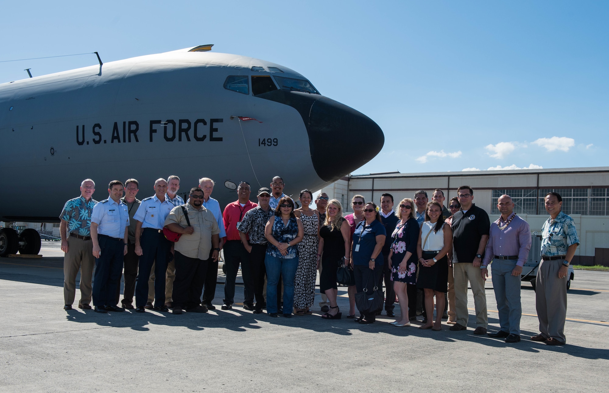 A group from the Commonwealth of the Northern Mariana Islands, the Commonwealth Port Authority, and Department of Defense civilians, contractors and service members take a photo in front of a KC-135R Stratotanker on Joint Base Pearl Harbor-Hickam, Hawaii, Sept. 19, 2018.