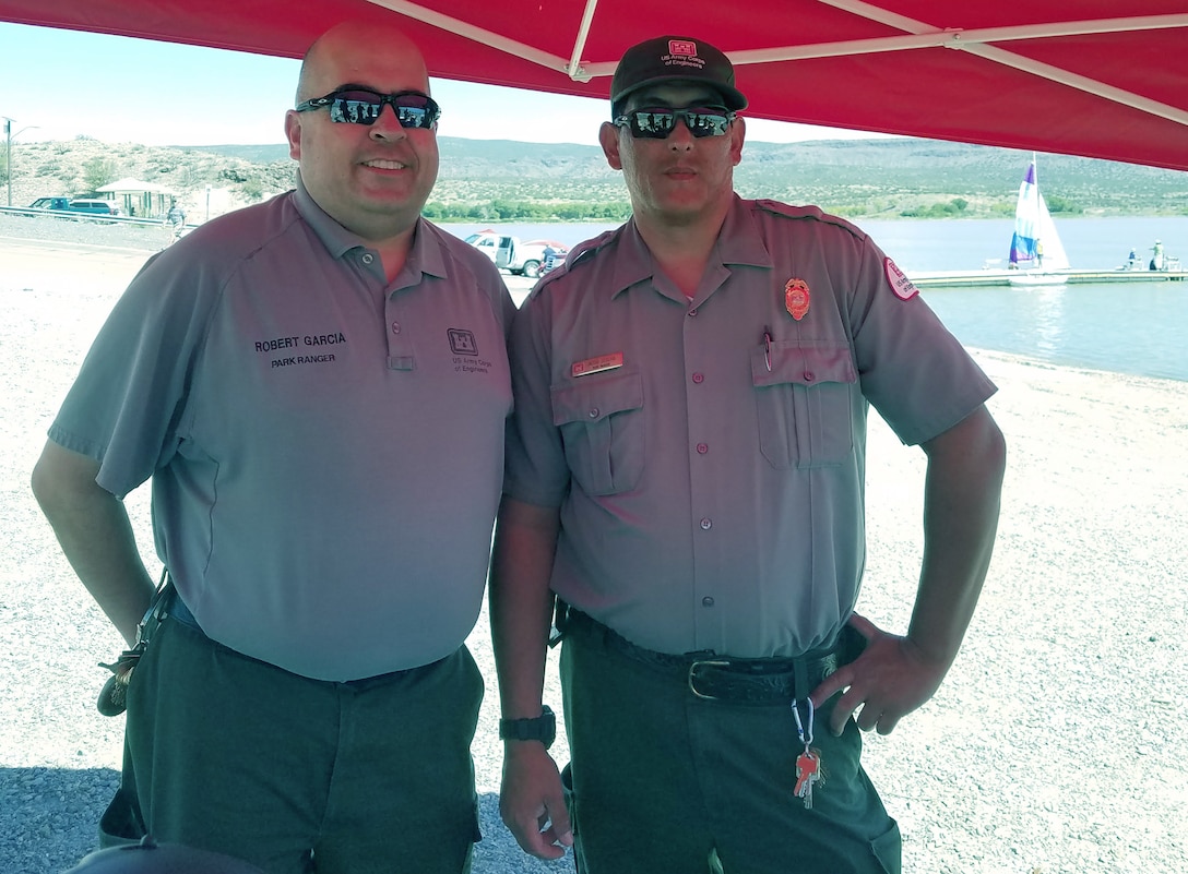 COCHITI LAKE, N.M. -- Park rangers Robert Garcia (left) and Jacob Segura, pause for a photo during the lake’s National Public Lands Day event, Sept. 22, 2018