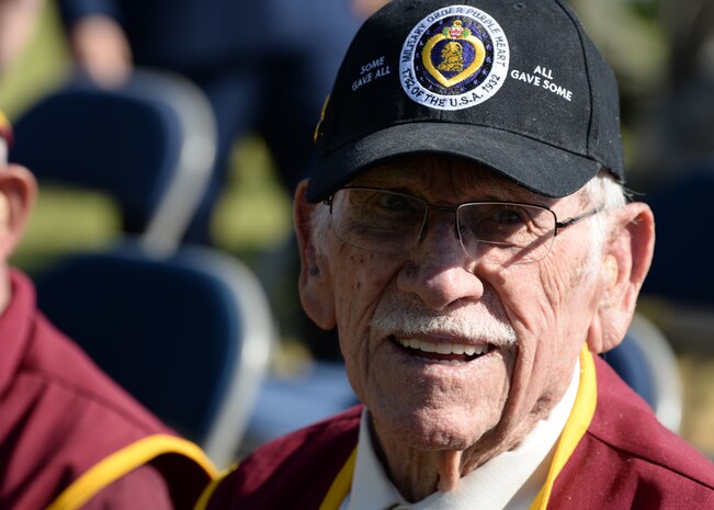 Dean Whitaker, former Prisoner of War, speaks to people who attended this years the POW/Missing in Action ceremony at Freedom Park on Nellis Air Force Base, Nev., Sept. 21, 2018. Whitaker was captured after his plane crashed resulting in him being the sole survivor of the crash. (U.S. Air Force photo by Airman 1st Class Bryan T. Guthrie)