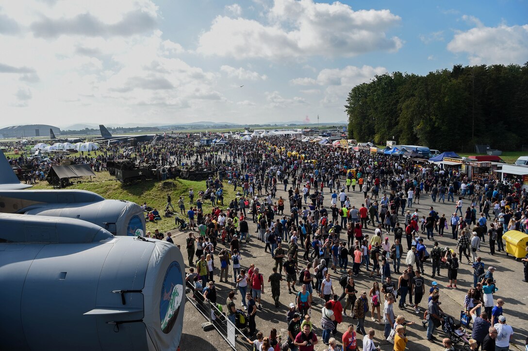 Patrons of the NATO Days Air Show view NATO allies’ and partner nation’s military ground and aviation equipment on display during the air show in Ostrava, Czech Republic, Sept. 15, 2018. Airmen from the 4th Airlift Squadron, alongside 18 NATO allies and partner nations, provided military ground and aviation equipment for the air show. (U.S. Air Force photo by Senior Airman Tryphena Mayhugh)