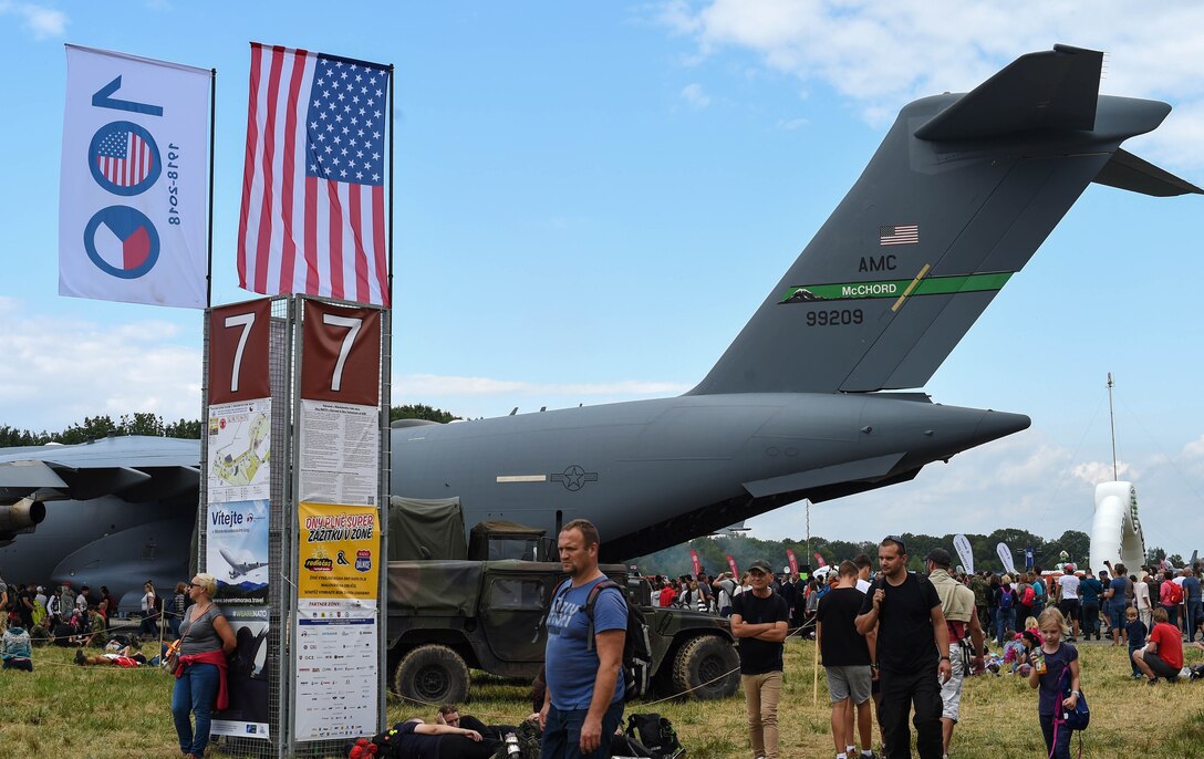 Patrons of the NATO Days Air Show look at U.S. military ground and aviation equipment on display during the air show in Ostrava, Czech Republic, Sept. 15, 2018. McChord Field, Wash., provided a C-17 Globemaster III to be displayed during the air show. (U.S. Air Force photo by Senior Airman Tryphena Mayhugh)