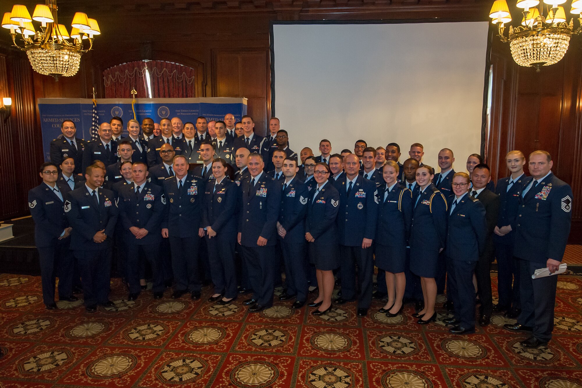 Attendees of The 71st Birthday of the U.S. Air Force ceremony presented by the Armed Services Council pose for a photo with Air Force Chief of Staff Gen. David L. Goldfein at The Union League of Philadelphia, Philadelphia, September 27, 2018. During the ceremony, Goldfein spoke to an audience of military and civilian personnel about the importance of the Air Force mission both inside and outside the continental U.S.