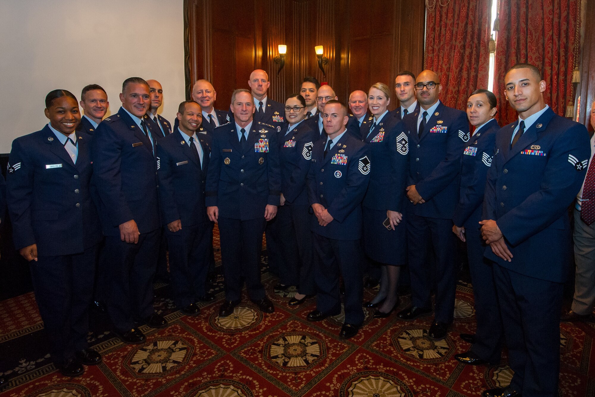 Reserve Citizen Airmen from the 514th Air Mobility Wing, Joint Base McGuire-Dix-Lakehurst, N.J., pose for a photo with Air Force Chief of Staff Gen. David L. Goldfein at The Union League of Philadelphia, Philadelphia, September 27, 2018. The members were in attendance to celebrate the 71st birthday of the U.S. Air Force.