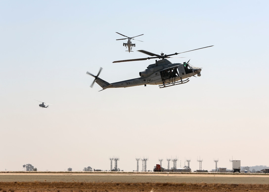 Marines demonstrate their aerial capabilities at the Marine Air Ground Task Force demonstration during the Marine Corps Air Station Miramar Air Show, San Diego, Calif., Sept. 28. This years air show honors "100 years of women in the Marine Corps" by featuring several performances and displays that highlight accomplishments and milestones women made since the first female enlistee, Olpha May Johnson, who joined the service in 1918. (U.S. Marine Corps photo by Cpl. Joshua S. McAlpine)