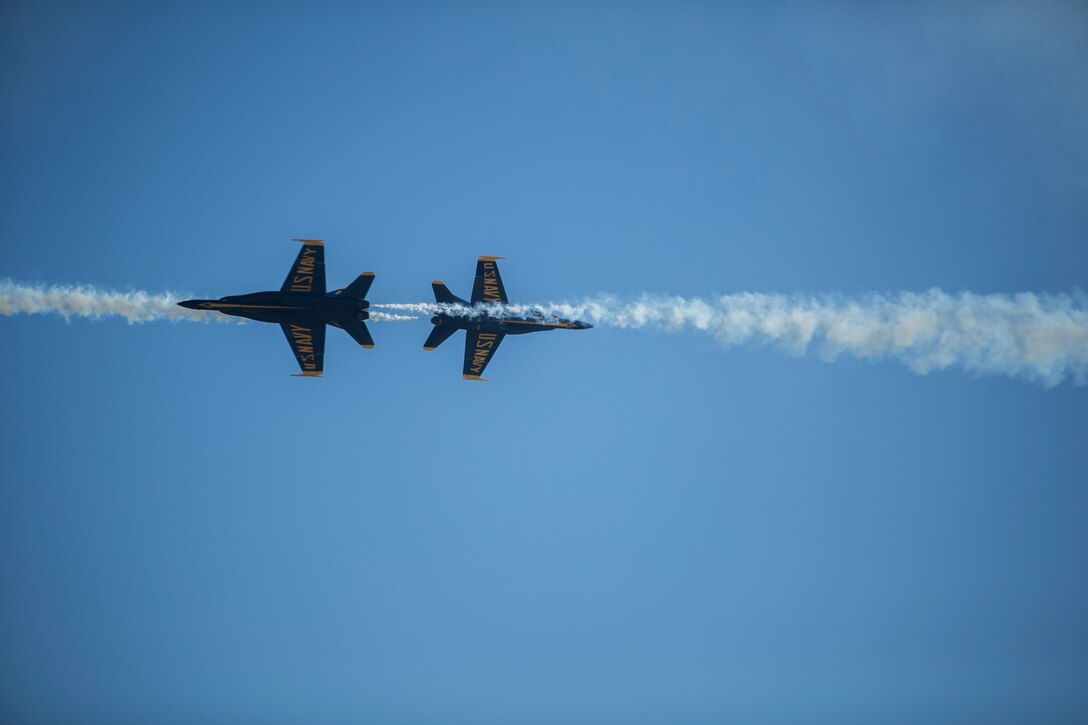 The U.S. Navy Blue Angel’s perform a dynamic aerial maneuver during the Marine Corps Air Station Miramar Air Show, MCAS Miramar, Calif., September 28. This year’s air show honors “100 years of women in the Marine Corps” by featuring several performances and displays that highlight accomplishments and milestones women since the first female enlistee, Opha May Johnson, who joined the service in 1918. (U.S. Marine Corps photo by Lance Cpl. Robert Alejandre)