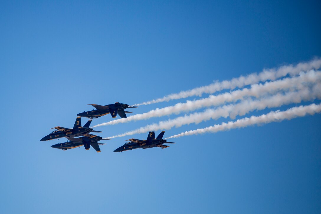 The U.S. Navy Blue Angels perform a dynamic aerial maneuver during the Marine Corps Air Station (MCAS) Miramar Air Show September 28, 2018 at Miramar, California.  This year’s air show honors “100 years of women in the Marine Corps” by featuring several performances and displays that highlight accomplishments and milestones women since the first female enlistee, Opha May Johnson, who joined the service in 1918.  (U.S. Marine Corps photo by Lance Cpl. Robert Alejandre)