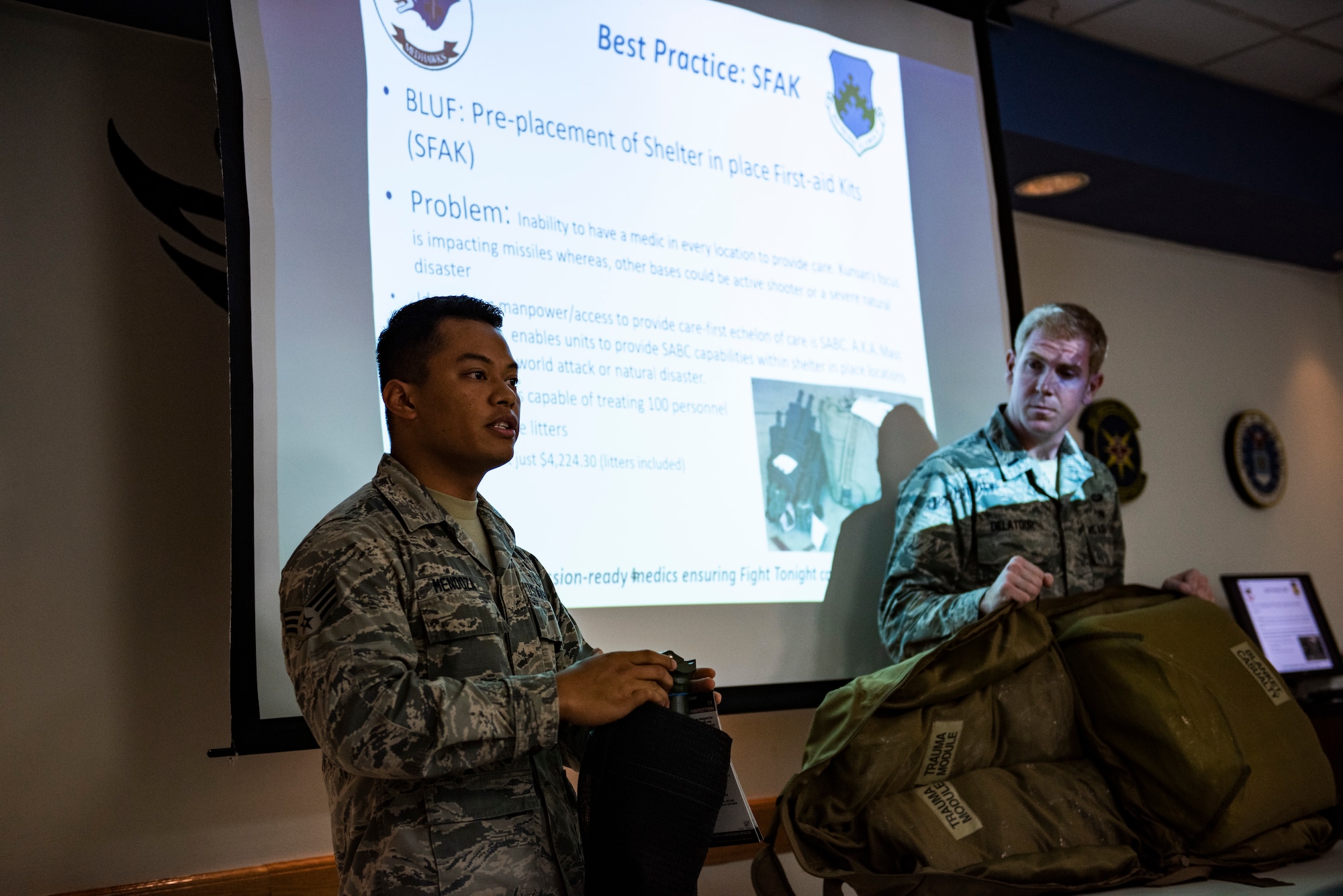 Senior Airman Adam Mendoza, medical materiel technician from the 8th Medical Support Squadron, presents a plan for Shelter-in-place First Aid Kit distribution at Kunsan Air Base, Republic of Korea, Sept. 25, 2018. The SFAK was showcased during the Air Force Surgeon General’s visit to the 8th Medical Group to show it’s importance of being implemented. (U.S. Air Force photo by Senior Airman Stefan Alvarez)