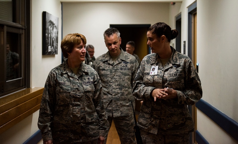 U.S. Air Force Master Sgt. Kelly Hocker, medical technician at the 8th Medical Operations Squadron (right), talks with Lt. Gen. Dorothy Hogg, Air Force Surgeon General (left), and Chief MSgt. G. Steve Cum, Chief of the Medical Enlisted Force (center) during a tour of the 8th Medical Group at Kunsan Air Base, Republic of Korea, Sept. 25, 2018. General Hogg and Chief Cum toured the 8th MDG to examine their capabilities and talk with the Airmen on a personal level. (U.S. Air Force photo by Senior Airman Stefan Alvarez)