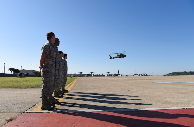 Leadership from the 8th Medical Group await U.S. Air Force Lt. Gen. Dorothy Hogg, Air Force Surgeon General, as she and Air Force Medical Service leadership arrive at Kunsan Air Base, Republic of Korea, Sept. 25, 2018. Air Force Medical Service leadership visited the 8th MDG here to observe the progress and challenges of the military treatment facilities in the Pacific. (U.S. Air Force photo by Senior Airman Savannah L. Waters)