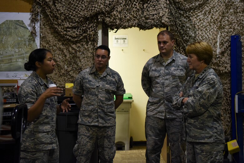 U.S. Air Force Senior Airman Celina Garcia, 8th Medical Support Squadron war reserve material technician, briefs Lt. Gen. Dorothy Hogg, Air Force Surgeon General, at Kunsan Air Base, Republic of Korea, Sept. 25, 2018. Gen. Hogg inspected all of the clinics and facilities and held an all-call with the Airmen from the medical group to lay out her expectations and goals as the Surgeon General. (U.S. Air Force photo by Senior Airman Savannah L. Waters)