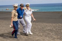 U.S. Marine Corps Col. Maura M. Hennigan, left, Ronald G. Sharfe, center, U.S. Navy veteran and U.S. Navy Rear Adm. Shoshana Chatfield, right, walk along the beaches of Iwo To, Japan March 23, 2019. The 74th Reunion of Honor ceremony remembers veterans who fought for their respective countries on Iwo To’s hallowed ground. Their sacrifice inspired peace, security and stability in the Indo-Pacific region. Hennigan, a native of Sayville, New York, is the commanding officer of Combat Logistics Regiment 3, 3rd Marine Logistics Group. Chatfield, a native of Garden Grove, California, is the commander of Joint Region Marianas. Sharfe is a native of Missoula, Montana. (U.S. Marine Corps photo by Lance Cpl. Armando Elizalde)