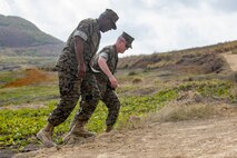 U.S. Marine Corps Sgt. Maj. Ronald L. Green, left, and Sgt. Maj. James N. Calbough, right, walk up a beach on Iwo To, Japan March 23, 2019. The 74th Reunion of Honor ceremony remembers veterans who fought for their respective countries on Iwo To’s hallowed ground. Their sacrifice inspired peace, security and stability in the Indo-Pacific region. Green, a native of Jackson, Mississippi, is the Sergeant Major of the Marine Corps. Calbough, a native of Trenton, Michigan, is the Sergeant Major of 3rd Marine Logistics Group. (U.S. Marine Corps photo by Lance Cpl. Armando Elizalde)