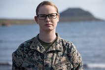 U.S. Marine Corps Lance Cpl. Danikamarie D. Lester, a water support technician with Combat Logistics Regiment 3 Support Detachment, 3rd Marine Logistics Group, poses for a photo on Iwo To, Japan March 22, 2019. The water support technicians made potable water from ocean water to be used in support of the 74th Reunion of Honor on Iwo To. More than 150 Marines and Sailors from III Marine Expeditionary Force and major subordinate commands make up the detachment tasked with all administrative and logistical support. Lester is a native of Deridder, Louisiana. (U.S. Marine Corps photo by Lance Cpl. Armando Elizalde)