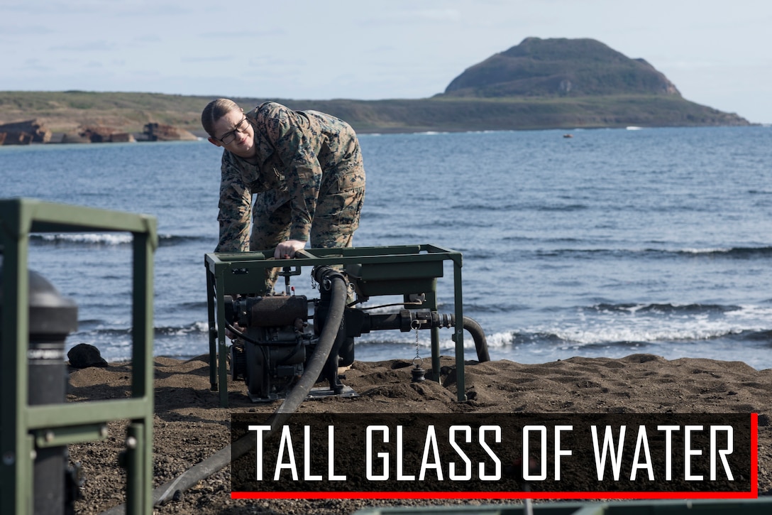 U.S. Marine Corps Lance Cpl. Danikamarie D. Lester, a water support technician with Combat Logistics Regiment 3 Support Detachment, 3rd Marine Logistics Group, turns on a suction pump on Iwo To, Japan March 22, 2019. The water support technicians made potable water from ocean water to be used in support of the 74th Reunion of Honor on Iwo To. More than 150 Marines and Sailors from III Marine Expeditionary Force and major subordinate commands make up the detachment tasked with all administrative and logistical support. Lester is a native of Deridder, Louisiana. (U.S. Marine Corps photo by Lance Cpl. Armando Elizalde)