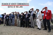 U.S. Marine Corps, Army and Navy World War II veterans render honors during the 74th Annual Reunion of Honor ceremony March 23, 2019 at Iwo To, Japan. Dozens of WWII veterans and veterans of the Battle of Iwo Jima took part in the ceremony. The Reunion of Honor ceremony is held annually to commemorate the heroism and sacrifices made by service members during the Battle of Iwo Jima in World War II. (U.S. Marine Corps photo by Sgt. Tiffany Edwards)