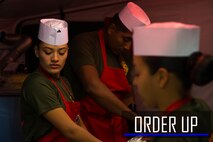 U.S. Marines with Food Service Company, Combat Logistics Group 37, 3rd Marine Logistics Group, prepare food for the W.P.T. Hill Award evaluation March 14, 2019 on Camp Kinser, Okinawa, Japan. Food service specialists cooked to display their technical proficiency and knowledge within the field kitchen environment. (U.S. Marine Corps photo by Lance Cpl. Isaiah Campbell)