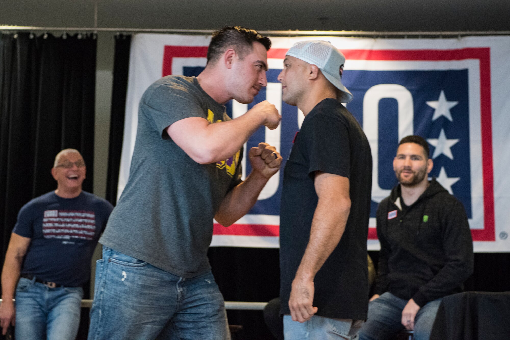 (center left) A member of the audience faces off with BJ Penn, former Ultimate Fighting Championship Lightweight and Welterweight Champion, during the USO Spring Visit on Ramstein Air Base, Germany, March 30, 2019.