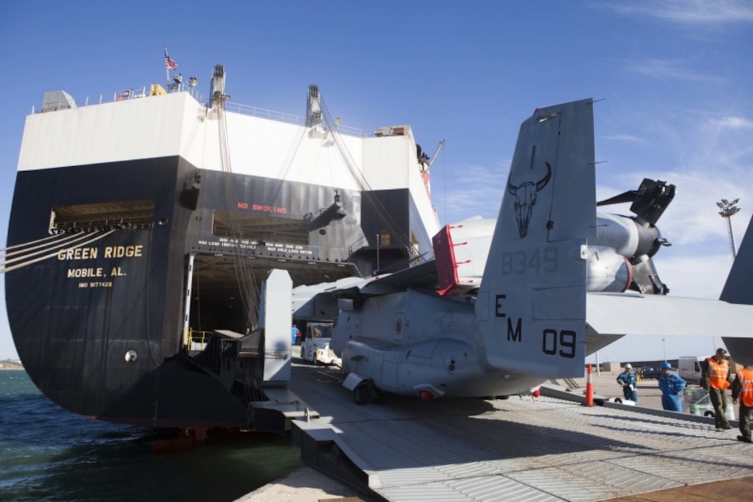 A U.S. Marine Corps MV-22B Osprey is unloaded from the MV Green Ridge March 29, 2019, at Naval Station Rota, Spain. The aircraft were delivered in support of Special Purpose Marine Air-Ground Task Force-Crisis Response-Africa 19.2 as they prepare to take authority of SPMAGTF-CR-AF from 19.1 for operations within the area of responsibility. The MV-22 increases SPMAGTF-CR-AF’s operational reach and can swiftly project U.S. Marine combat power to emerging crises. The aircraft is with Marine Medium Tiltrotor Squadron 261, SPMAGTF-CR-AF 19.2, Marine Forces Europe and Africa.