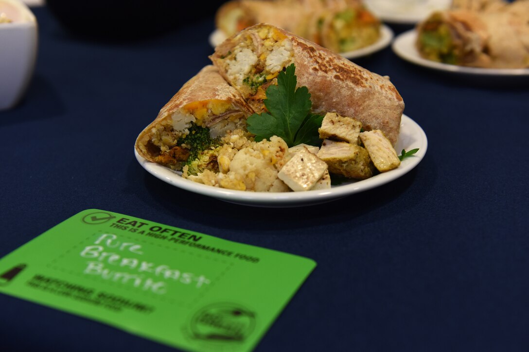 A pure breakfast burrito is set out as a tasting sample during a pre-opening for the new Go for Green 2.0 program at the Knight’s Table dining facility March 22, 2019. The dining facility will implement the Department of Defense’s new G4G 2.0 program starting April 1, 2019. (U.S. Air Force photo by Airman 1st Class Madeline Herzog)