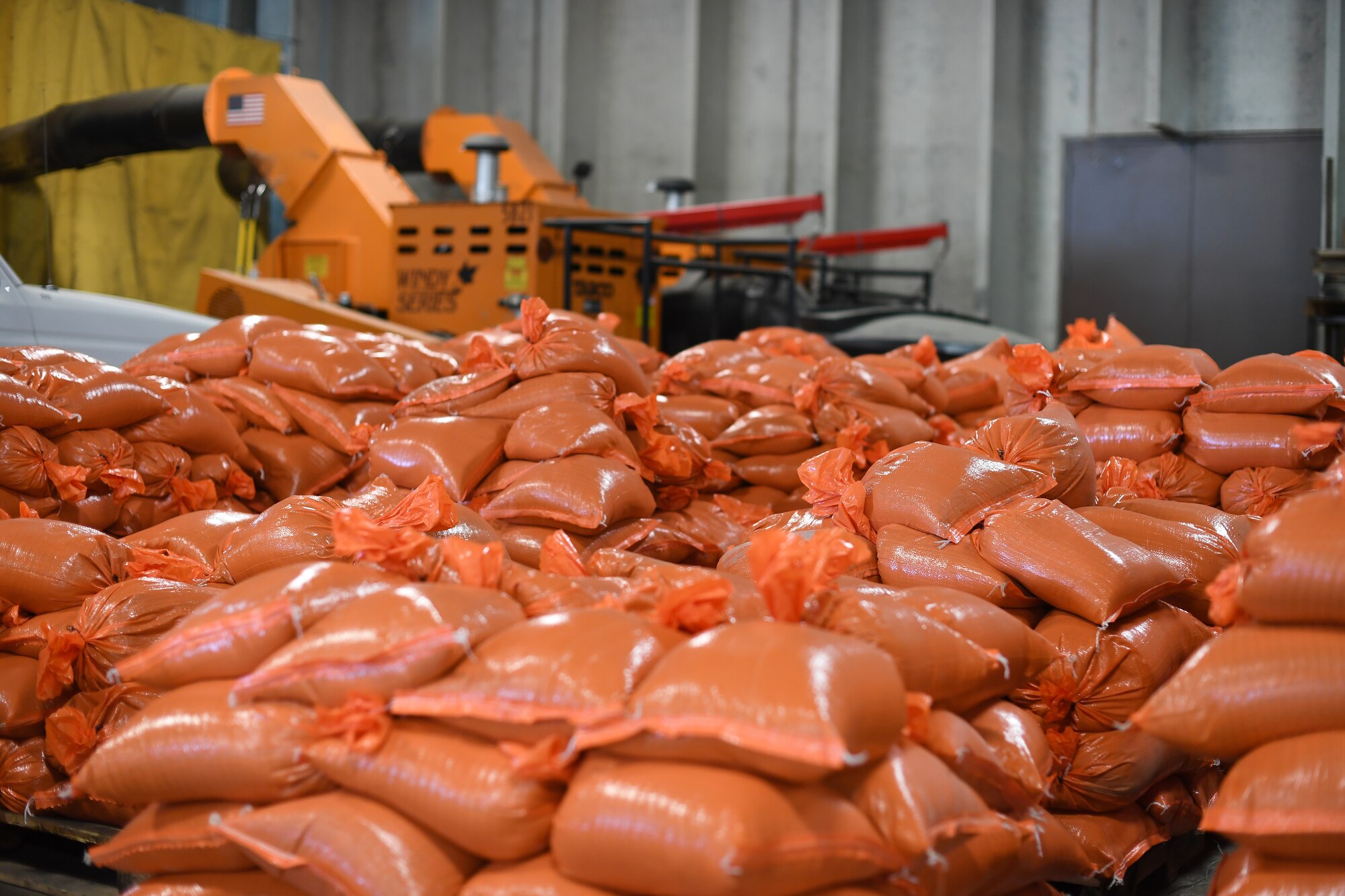 Completed sandbags sit on paletts during a sandbag stockpile event March 28, 2019, in Grand Forks, North Dakota. Each pallet held between 50-70 bags, meant to protect the city of Grand Forks in case of flooding in April. (U.S. Air Force photo by Senior Airman Elora J. Martinez)