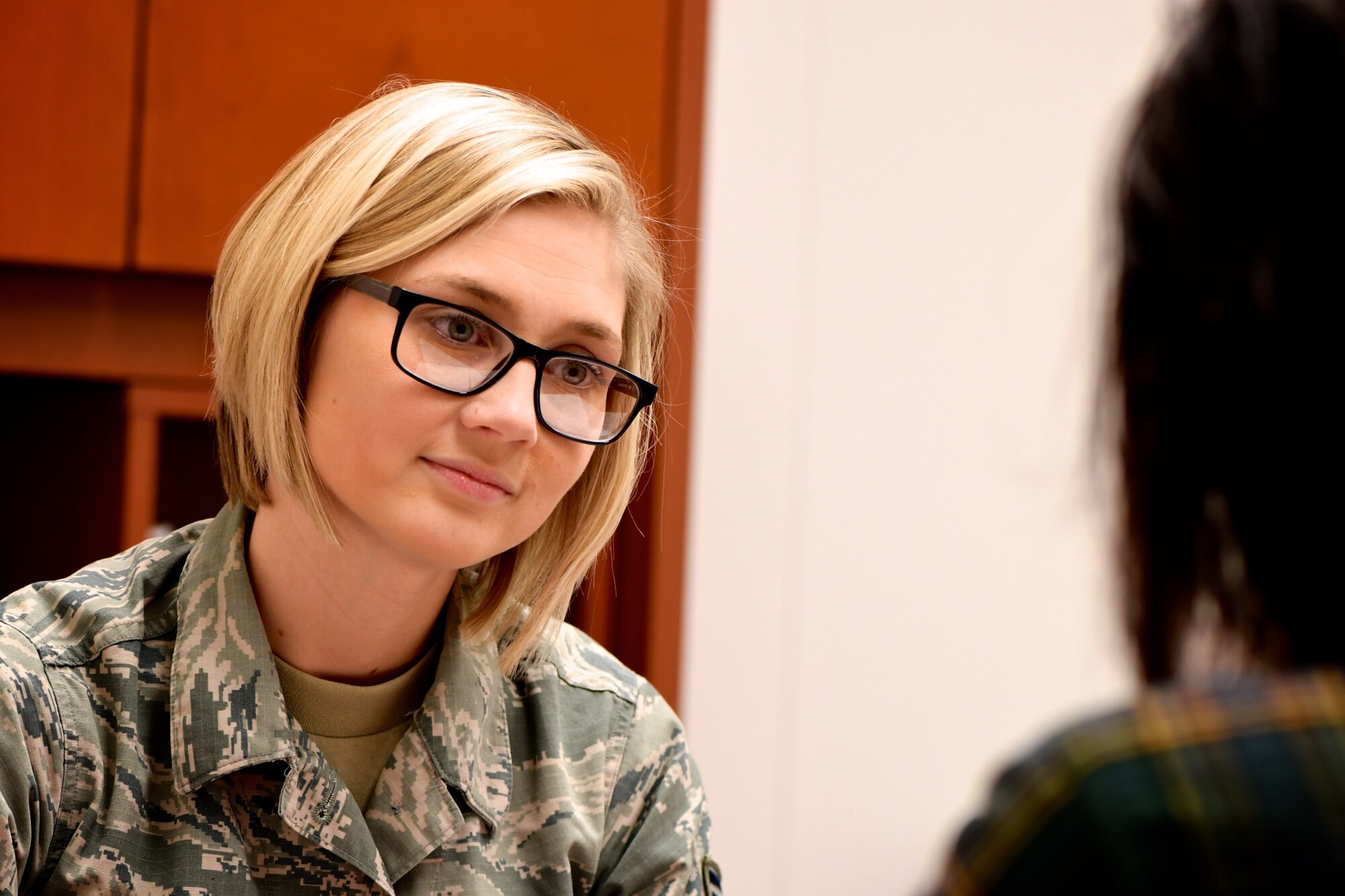 Recruiter Staff Sgt. Jennifer Deimund answers questions from a potential applicant during a college visit at the University of Illinois, on March 21, 2019, near Springfield, Illinois.  Sergeant Deimund met with college counselors and interviewed perspective recruits on what it means to serve in the Air Force Reserve Command.  She and other recruiters are ready to help applicants with their questions.  Those interested in joining the Air Force Reserve Command can call 1-800-257-1212 for more information.  Current members can help that process by recommending friends through the "Get One Now" program by logging on to https://www.get1now.us and register to be eligible for prizes.  (U.S. Air Force photo by Lt. Col. Stan Paregien)