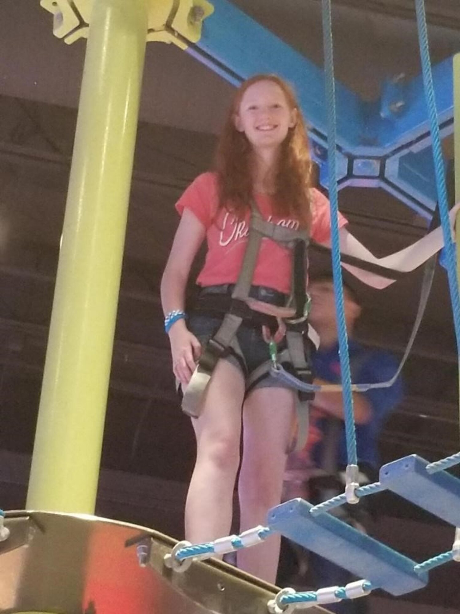 Hannah Bradley, 97th Air Mobility 2018 Youth of the Year, climbs an obstacle course as part of a field trip put on through the Altus Air Force Base Youth Programs. (Courtesy photo by Shawna Heiser)