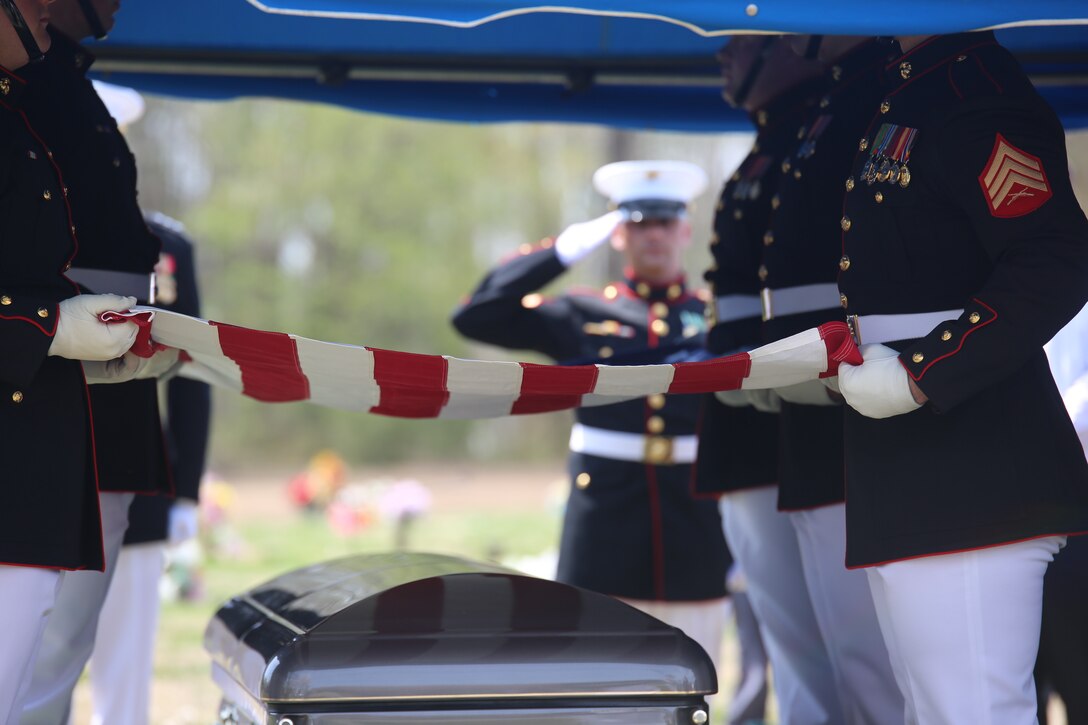Marines with Marine Barracks Washington D.C., support a full honors funeral for retired Marine Lt. Col. Howard V. Lee, Medal of Honor recipient, at Colonial Grove Memorial Park, Virginia Beach, Virginia, March 30, 2019. Lee received the Medal of Honor for his actions during the Vietnam War in August 1966. While on an operation deep in enemy territory, Lee’s platoon was attacked and surrounded by a large Vietnamese force. Realizing his unit suffered numerous casualties and fully aware the platoon remained under heavy attack, Lee took seven men and proceeded by helicopter to provide reinforcements. After fearlessly moving from position to position and encouraging his men to keep fighting, he was wounded by fragments from an enemy grenade in several areas of his body, including his eye. Despite his wounds, Lee continued optimistically throughout the night to direct a valiant defense, coordinate supporting fires, and apprise higher headquarters of the plight of the platoon. Lee retired at the rank in 1975, after 20 years of service. Lee passed away March 23, 2019; he was 85.