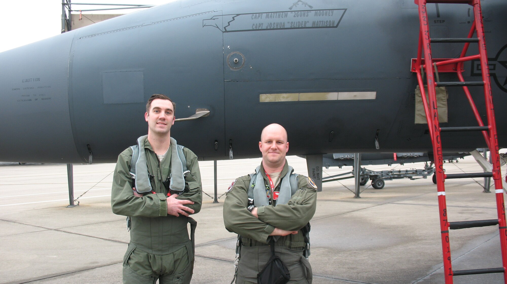 Tech. Sgt. Chris Bieber, 26th Operational Weather Squadron (OWS) shift supervisor, and Capt. Matthew Mooney, a 333rd Fighter Squadron F-15E pilot, stand in front of an F-15E Strike Eagle aircraft at Seymour Johnson Air Force Base, North Carolina, Feb. 21, 2019. Bieber was one of two 26th OWS Airmen to receive a familiarization flight aboard two F-15E Strike Eagles to see firsthand how their weather products affect the fighters’ mission. (Courtesy photo)