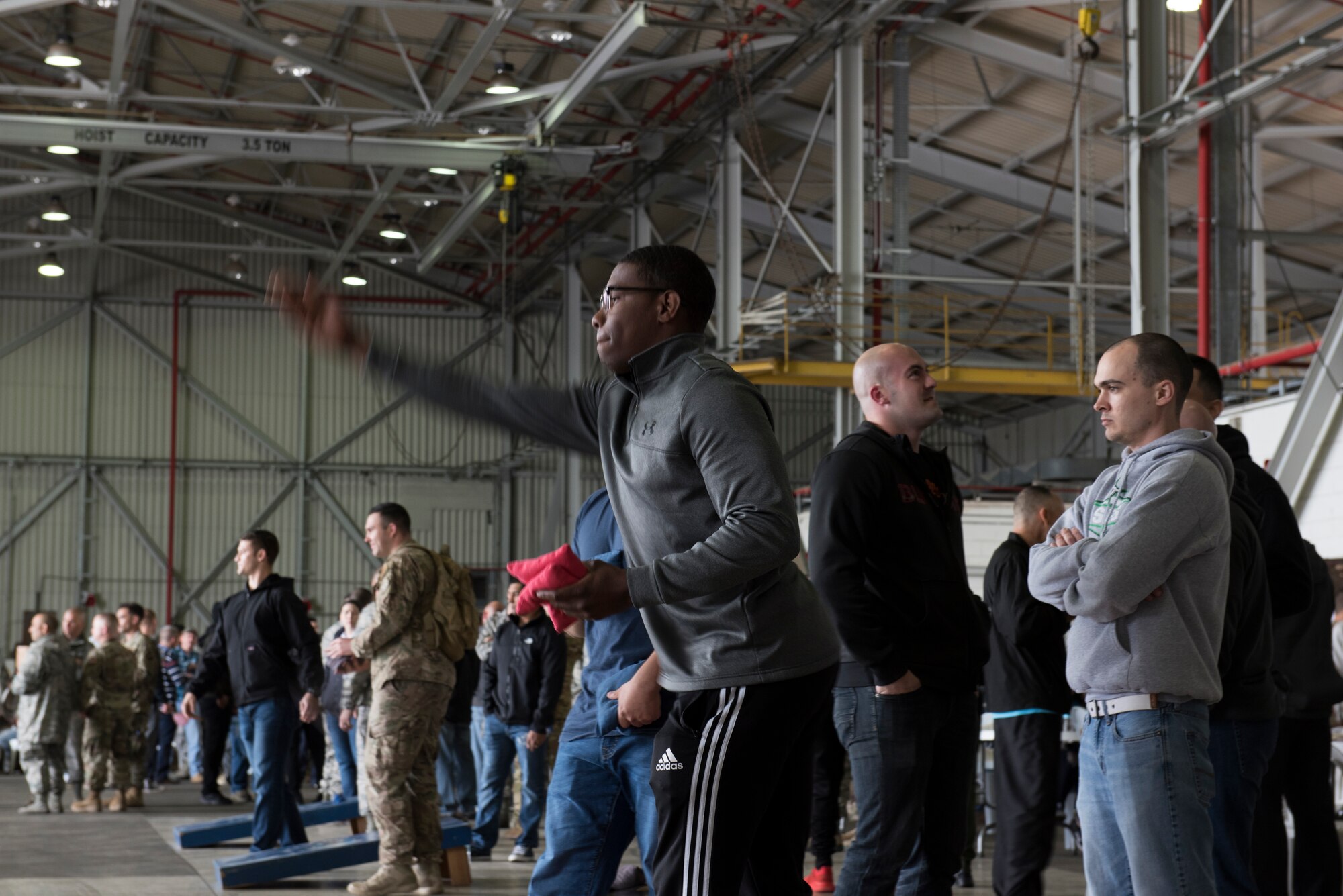 An Airman tosses a corn hole bag during the Airmen Appreciation BBQ March 29, 2019, at Incirlik Air Base, Turkey.