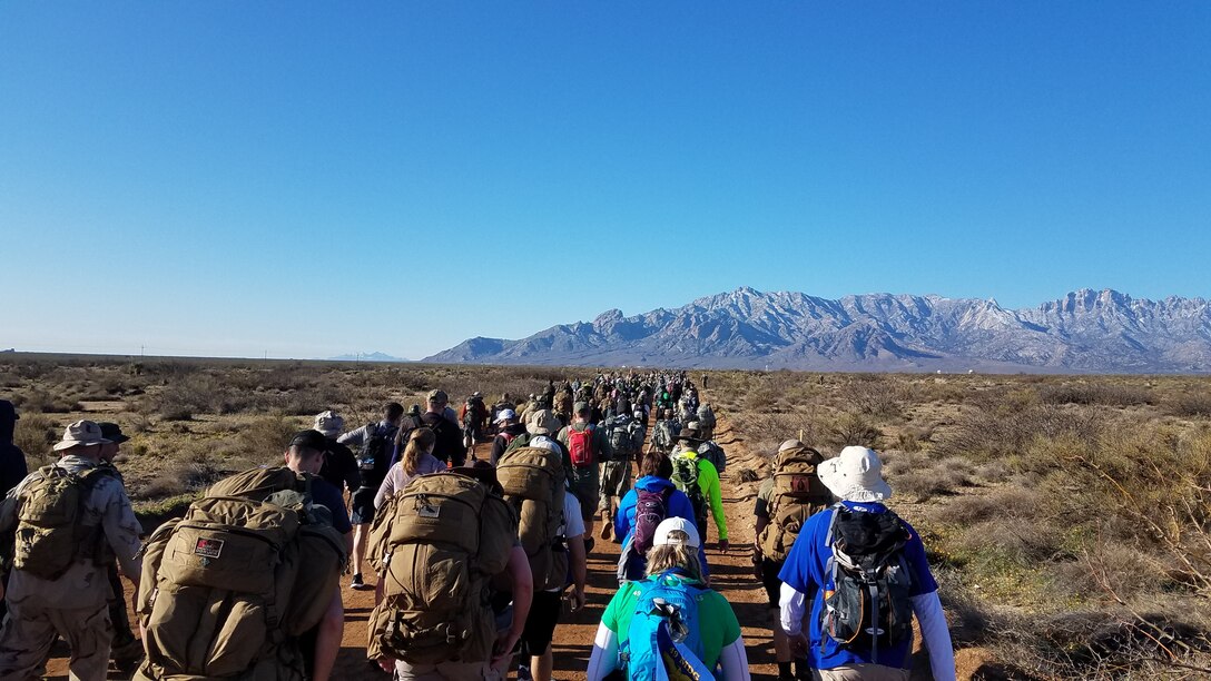 More than 8,000 attendees honored the U.S. and Filipino soldiers by marching 26.2 miles over desert terrain.