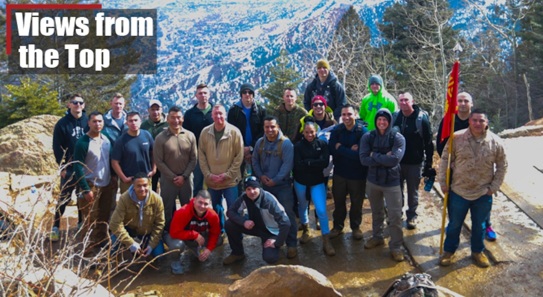 U.S. Marine Corps top performing staff non-commissioned officers and recruiters from the 8th Marine Corps District pose for a photo during a hike up the Manitou Incline in Manitou Springs, Colorado.