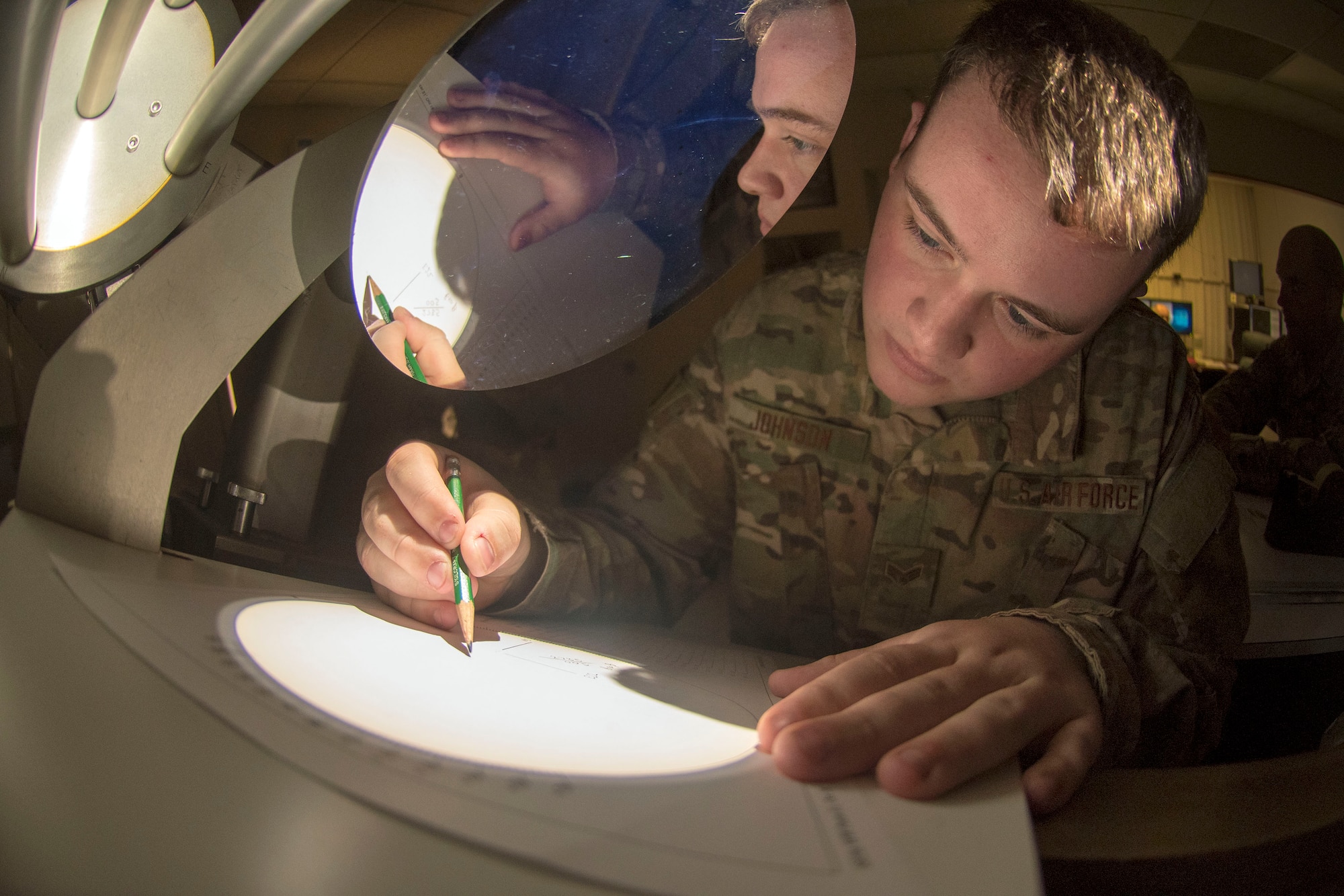 Senior Airman Sidney Johnson, 2d Weather Squadron, Detachment 4, solar analyst, completes a daily sunspot analysis, March 19, 2019, on Holloman Air Force Base, N.M. Holloman is one of five DoD solar observatories around the world. (U.S. Air Force photo by Staff Sgt. Christine Groening)